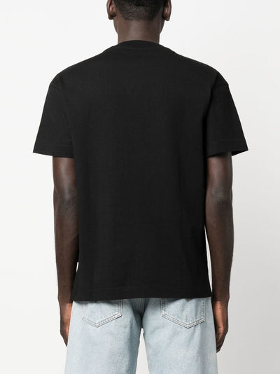 Palm Angels Yellow Star Sprayed logo-print T-shirt in Black